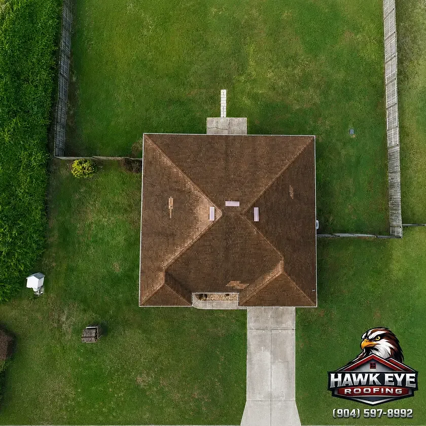 Overhead drone inspection photo of a weathered brown shingle roof in the Jacksonville area